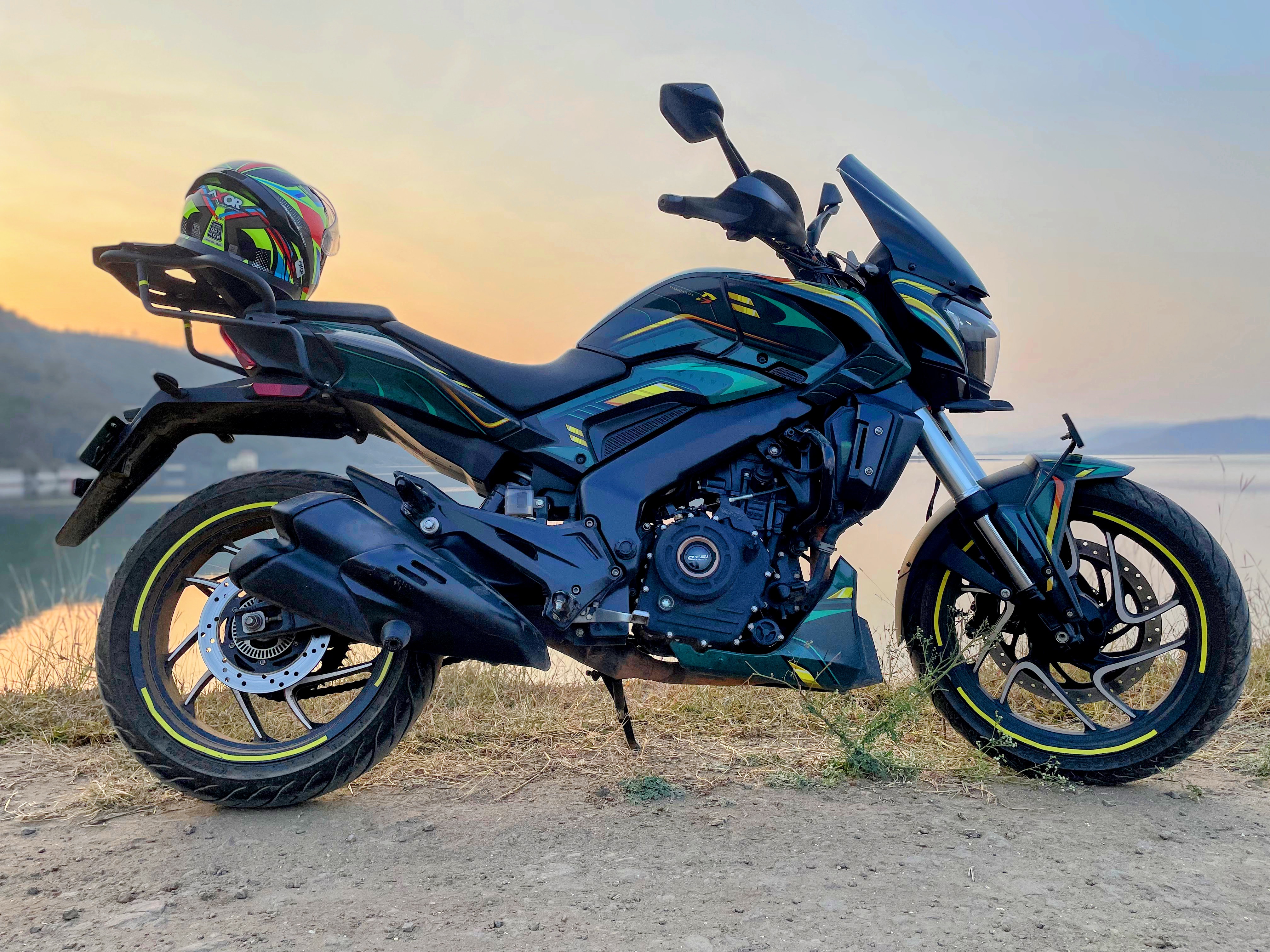 The hero shot: full side profile at lakeside sunset